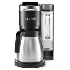 keurig coffee maker with glass carafe and stainless steel finish on the side