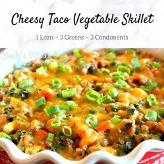 cheesy taco vegetable skillet with text overlay