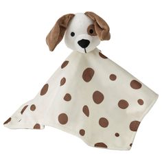 a brown and white dog with spots on it's face is wrapped in a blanket