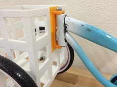 a close up of a bike handlebar on a wooden floor