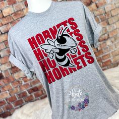 Treat yourself or anyone in your life to this awesome School pride tshirt. It's a hornet thing. Great for all occasions. And great for supporting your eagles team. Shirt is made of 100% polyester and soft to the touch. To get the best wear from your shirt please 1. Wash with mild detergent 2. Do not use fabric softener 3. Do not use bleach 4. Tumble dry low. Please enjoy your shirt as I know we have enjoyed all the ones we have made for ourselves!! Please note that every shirt is made to order a Elementary School Spirit Shirts, Spirit Wear Shirts, Cheer Designs, Eagles Team