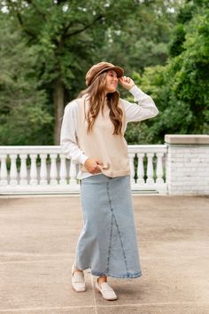 A new favorite, the 'Brooklyn' denim maxi skirt is an essential for your closet. This denim maxi skirt features a stunning vintage wash and comfortable silhouette, so you can be stylish on the go. Pair with a fitted blouse and a tote bag for the perfect look for the farmer's market or a brunch with friends! Exclusively designed by us with you in mind. 97% Cotton, 3% Spandex Hand Wash Cold Hang or Lay Flat to Dry Do Not Bleach Do Not Dry Clean Iron Low Heat Model Height 5'6" | Wearing Size 6 Mode