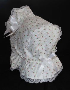 A beautiful Victorian style baby bonnet. Fabric is white searsucker with rosebuds. Lining is white . Bonnet has an extended back and is trimmed with white lace. Bows and extra long ties are made of white double sided satin ribbon. Size/ Measurement from under ear lobe around top of head to under other ear lobe preemie / 10 inches 0-3 months / 11 inches 3-6 months / 12 inches 6-9 months / 13 inches 9-12 months / 14 inches 12-18 months/ 15 inches White Bonnet, Newborn Bonnet, Baby Bonnet, Handmade Lighting, Lace Bows, Rising Sun, Victorian Style, Rose Buds, Victorian Fashion