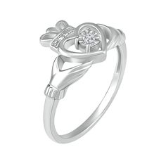 a white gold ring with two hearts on it