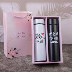 two personalized travel mugs in a pink gift box