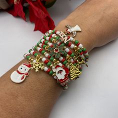 These Christmas stretchy seed bead bracelets are handcrafted personally for me, Derlis. You can pick your size bracelet. Choose your favorite charm/style or without charm, mix and match and create your own stack. Perfect Christmas gift for both kids and adults alike. Also, fun to combine with your Ugly Christmas Sweater, to wear everyday during Christmas season or at Christmas parties with family and friends. It is very important that you measure your wrist before placing your order to find your Seed Bead Christmas Bracelets, Reindeer Christmas Tree, Christmas Tree Angel, Tree Angel, Christmas Bracelet, Christmas Charms, Reindeer Christmas, Christmas Parties, Bead Bracelets