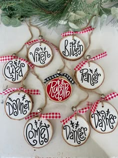 christmas ornaments are arranged on a table