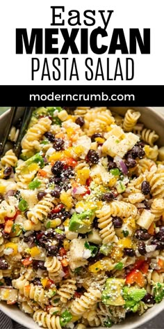 mexican pasta salad in a white bowl with black olives