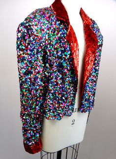 "This is such a colorful vintage piece! It's completely hand embellished with bright and colorful sequins and is in excellent condition! Measurements are taken with the front brought together and both bottom closures intact. Bust - 48\" Waist - 40\" (taken around bottom hem) Length - 19\" Tag Size - Extra Large All of my items come from a smoke-free and pet-free home. If you have any questions, please don't hesitate to ask!" Multicolor Sequined Party Outerwear, Party Multicolor Sequined Outerwear, Multicolor Sequined Outerwear For Party Season, Fitted Multicolor Sequined Outerwear, Multicolor Embellished Party Outerwear, Embellished Multicolor Party Outerwear, Prom Jacket, Hawaiian Cruises, Checkered Jacket