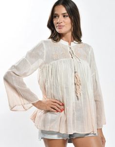 White bohemian embroidered top with lurex woven in for extra dreamy styling. Paired here with our Feeling Peachy ultra wide leg high waist pants. Spring Bohemian Relaxed Fit Tops, Bohemian Relaxed Fit Tops For Spring, Bohemian Style Relaxed Fit Blouse For Spring, Bohemian Embroidered Top With Boho Collar For Spring, Bohemian Rayon Blouse For Spring, Bohemian Long Sleeve Embroidered Top For Vacation, Casual Embroidered Top With Boho Collar For Spring, Casual Blouse With Boho Collar For Spring, Casual Beige Embroidered Summer Top