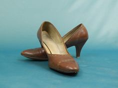 "Brown heels that are anything but basic Check out the brown top stitching detail  Thicker wooden heel that is not so narrow, so dating this to the early 50s 3\" high heels Size 7.5 AA (narrow)- these are truly narrow From Naturalizer, and the logo also dates these to the 50s Part of an estate that wanted their fashion to be appreciated and loved again Condition- good- there is  still a lot of wear left in these but the heel tips need to be replaced- this is incorporated into the price Quick shipping via USPS Priority Mail If you do not like the price, let me know Find us at www.Facebook.com/carolinathriftchick Pinterest www.pinterest.com/qqfvintage/carolina-thrift-chick/ Instagram www.instagram.com/carolinathriftchick YouTube https://bit.ly/2FlCZCv 50s Brown Pointed Toe Pump Heels Brown T Heels Brown, Pump Heels, Womens Pumps, Wood Heel, Brown Heels, Wooden Heel, Brown Top, The 50s, Top Stitching