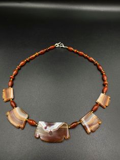 The beautiful necklace mala of carnelian agate with beautiful natural lines pattern good condition we provide fast and free shipping service world wide Artisan Carved Amber Necklace, Artisan Carved Agate Necklaces, Artisan Agate Carved Necklace, Artisan Carved Agate Necklace, Brown Agate Amulet Necklace, Artisan Brown Carnelian Necklace, Carnelian Amulet Necklace With Natural Stones, Brown Carnelian Amulet Necklace, Brown Carnelian Hand-strung Necklace