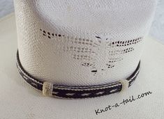 this horsehair hat band is a Bolder hat band done in black and white horsehair. 100% all natural horsehair. Everything you have been looking for in a Horsehair hat band. Distinctive look, uncompromising quality, and a unique design. * This is a 5 strand horsehair hat and that is about 5/8 inches wide.. You will find it easy to adjust to fit most any size hat with the two sliding knots. Brings out your spirit in an exclusive design that is vibrant as your western lifestyle. MEASUREMENTS * Longest White Adjustable Hat With Flat Crown, White Adjustable Flat Crown Hat, White Flat Crown Hat Bands For Beach, Custom Handmade Black Hat Bands, Handmade Black Hat Bands For Country Events, White Adjustable Classic Hat Bands, White Flat Crown Hat For Country Events, White Brimmed Hat Bands For Rodeo, Adjustable Black Hat Band For Rodeo