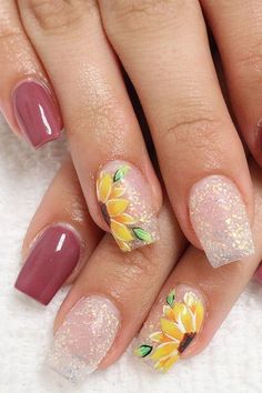 If you’re tired of your current nail style, here are some of the hottest summer sunflower nails trends to try this season. These nails are the most inspo-worthy nail art, polish colors, and trends from different colors of each nail to colorful nails. sunflower | sunflower nail art | summer nails colors | long summer nails ideas #sunflowernails #summernails #nailart #instylenails Nails With Flowers, Sunflower Nails, Nail Polishes, Sunflower, Manicure, Flowers, Art