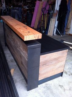 a large wooden box sitting on top of a floor