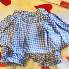 Cute Little Poofy Gingham Skort With A Bow On The Front And Back Shirring For Comfort! Perfect For A Kawaii Outfit On Its Own, But Just As Great For Lounging, Sleeping, Or Wearing Under Something Else For Modesty. These Are New With The Tag From A Small Chinese Brand Bought Directly From The Chinese-Only Shopping Site, Taobao. They Were Only Removed From The Package For Pictures. Us Size Xs-S. Cute Spring Bloomers, Cute Cotton Bloomers For Spring, Blue Cotton Bloomers With Ruffles, Cute Blue Summer Bloomers, Cute Light Blue Cotton Bottoms, Blue Ruffled Bloomers For Summer, Playful Blue Ruffled Bottoms, Summer Blue Ruffled Bloomers, Cute Plaid Bottoms For Spring