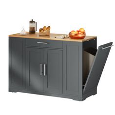 a kitchen island with an open door on the top and drawers below it, in front of a white background