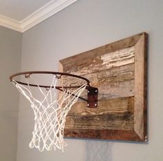 a basketball hoop hanging from the side of a wall with an instagram post underneath it