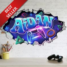 a wall sticker with the word adn on it in front of a white brick wall