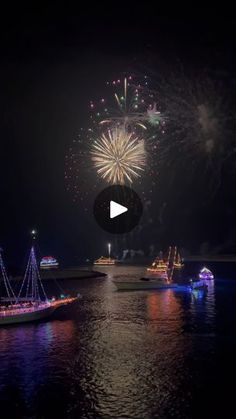 fireworks and boats in the water at night