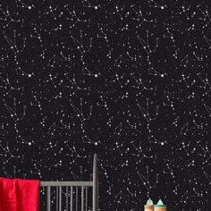 the night sky with stars and constellations is shown in this child's room