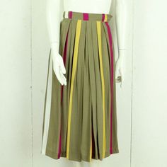 Brand: Vintage Product: Skirt Details: olive, colorful, striped, high waist, zipper, side pockets Women's size: S single waist width: 32 cm Length: 76cm Condition: very good, used Material: 100% viscose 14 day right of withdrawal | free store pick up in Berlin If you have any questions, please contact us by phone or email. We are happy to help you Monday to Saturday from 12:00 p.m. to 6:00 p.m. Please also note the dimensions as the sizes vary depending on the manufacturer. If you don't like or Vintage Midi Skirt, Skirt Details, High Waist Skirt, Cancellation Policy, Used Clothing, Waist Skirt, Retro Fashion, Favorite Outfit, High Waisted Skirt