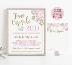 a pink and gold floral print with the text time capsule on it, next to a card