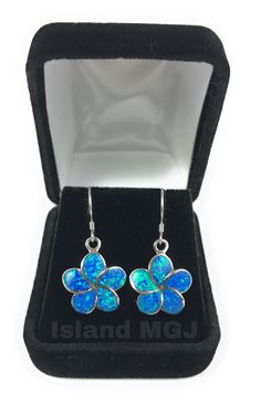 Blue Opal Plumeria Earring 15mm size Solid 925 Sterling Silver Plumeria Earring with Blue Opal set within the piece. Beautiful and elegant piece. Hook style Dangle earring. Every order comes with a gold gift box. Free shipping on every order. Blue Sterling Silver Earrings With Flower Charm, Sterling Silver Flower-shaped Earrings, Sterling Silver Flower-shaped Jewelry With Matching Earrings, Blue Flower Shaped Jewelry With Ear Wire, Blue Flower-shaped Jewelry With Flower Charm, Blue Flower-shaped Sterling Silver Earrings, Blue Sterling Silver Flower Earrings, Blue Sterling Silver Flower Earrings For Pierced Ears, Blue Flower Sterling Silver Earrings