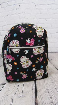 "Handmade Backpack with adjustable straps, made with cotton fabric and fusible batting. this backpack also has two d rings on each side to clip your keys or chap-stick holder. measurements are 14 1/2\" H 10 1/2\"W 4 1/2 D" School Bags With Cell Phone Pocket, School Bag With Cell Phone Pocket In Cotton, School Bags With Cell Phone Pocket In Cotton, Rectangular Cotton School Backpack, Cute Cotton Backpack For Everyday Use, Cute Everyday Cotton Backpack, Manhattan Ks, Handmade Backpack, Handmade Backpacks