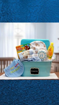 Celebrate the arrival of a beautiful baby with a generously filled, Baby Basics Gift Pail Blue hamper. It overflows with a collection of selected baby necessities that any new parent will love. The adorable gift basket makes for great storage in babies room after the gift is used. Our each and every gift basket is hand crafted, hand wrapped in cellophane and created when you place your order to become a one of a kind creation. New Baby Gift Basket Boy, Baby Boy Gift Baskets Simply Unique Baby Gifts, Newborn Baby Gift Basket, New Baby Gift Basket, Boy Gift Basket, Baby Boy Gift Baskets, Baby Gift Baskets, Babies Room, Baby Basics