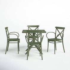 three chairs and a table are shown in the same color as they appear to be made out of wood