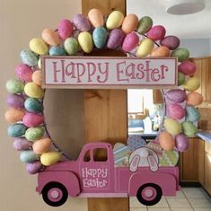 a pink truck with an easter wreath on it