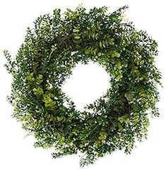 a wreath with green leaves on it