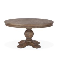 a round wooden table with two pedestals on each end and an oval wood top