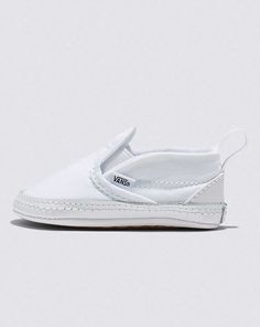 Infant Slip-On V Crib Shoe Vans Sneakers With Textured Sole For Spring, Vans Slip-ons With White Sole And Round Toe, Vans Slip-ons With Round Toe And White Sole, White Non-slip Low-top Slip-ons, Vans Slip-on Sneakers For Spring, Spring Sneakers With Soft Sole And Closed Toe, White Vans Slip-ons With Round Toe, White Synthetic Canvas Shoes With Textured Sole, White Slip-ons For Spring Streetwear