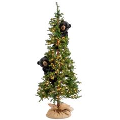 a small christmas tree with teddy bears on it