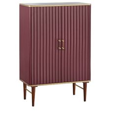 a red cabinet with brass handles and legs on the bottom, against a white background