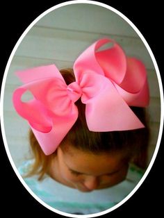 "This listing is for THREE extra- large boutique bows of your color choice.  Please refer to the color charts and indicate which color/ colors you would like in the \"note to seller\" box.     The bows are hand folded and hand sewn with top quality 3\" grosgrain ribbon. The finished bows measures either 7\" or 8.5\" across. The ends have been heat sealed to prevent fraying. The finished bows have been sprayed with a stiffening agent to ensure shape stability. The bows will be attached to either a fully lined 80mm (3\") French barrette or  alligator clip with teeth for griping. All bows will come with a color coordinated center knot. If you would prefer a flat center or different color knot, please leave a comment in the \"note to seller\" box THESE BOWS ARE HUGE   All of my bows are made i Hair Bow Instructions, Large Hair Bow, Cheer Hair Bows, Big Hair Bows, Large Hair Bows, Cheer Hair, Diy Bows, Bow Tutorial, Boutique Hair Bows