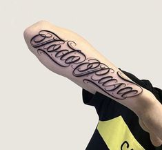 a person with a tattoo on their arm