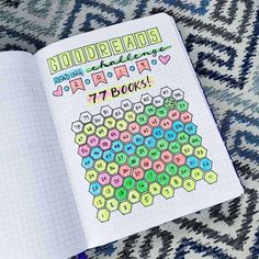 an open notebook with the words goodread written in colorful letters and numbers on it