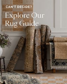 a pile of rugs with the words can't decide? explore our rug guide