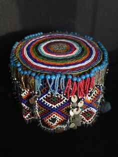 Bohemian Blue Beaded Hat, Blue Bohemian Beaded Hat, Traditional Multicolor Beaded Hat, Multicolor Bohemian Hat With Bead Caps, Multicolor Festival Hats With Bead Caps, Multicolor Beaded Caps Festival Hats, Multicolor Bead Cap Hats For Festivals, Multicolor Bead Caps Festival Hats, Multicolor Bead Caps Hats For Festival