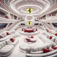 the interior of a luxury yacht with white couches and red pillows on the floor