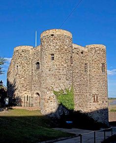 an old castle like structure is shown against a blue sky