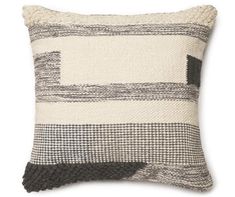 a black and white striped pillow on a white background, with a gray stripe down the middle