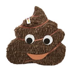 a brown poop with googly eyes and a tag on it