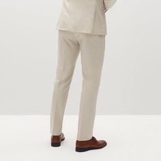 Embody laid-back elegance in the light tan suit pants. This mod, sandy shade with visible woven texture on these tan slacks is designed to suit you from sunny celebrations to the office, candlelit dinners, and everywhere in between. The men’s tan dress pants are crafted from signature Eco Stretch fabric, sure to keep you cool and comfortable through it all. Pair with the matching Men’s Tan Suit Jacket in the perfect light beige color for a clean look in a 2-piece suit, or style these suit pants Light Tan Suit, Groomsman Suits, Sand Dress, Tan Suit Jacket, Tan Dress Pants, Dress Pants Mens, Tan Suit, Tan Dress, Wedding Groomsmen