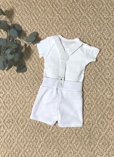 "This is the short sleeve with short pants version of the Boys Tuxedo for Baptisms, Christenings, Blessings and Weddings. If you need long sleeves please look at long sleeve listing at https://www.etsy.com/listing/579449576/baby-boy-baptism-christening-blessing?ref=shop_home_feat_2&frs=1 Beautiful, custom made outfit that is suitable for baptism, christening, blessings, weddings or any special event. A formal look with lots of comfort for your little man! Made using Carter's white bodysuits Fitted Short Sleeve Baptism Dress, Fitted Short Sleeve Baptism Dress For First Communion, Summer Baptism Dress With Short Sleeves, White Fitted Short Sleeve Baptism Dress, Fitted Baptism Dress With Short Sleeves For Summer, White Baptism Sets For Summer, White Summer Baptism Sets, White Sets For First Communion In Summer, White Short Sleeve Set For First Communion