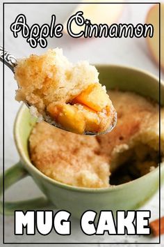 an apple cinnamon mug cake in a green cup with a spoon full of the cake