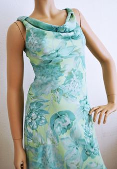 Teal, Blue , green, Green Dress, Summer ,Gown Size 5,6, dress Pretty light green and blue floral dress Dress size 5/6 Bust: 32'' Waist: 30'' Hips: 32'' Length from back of neck to bottom: 34'' 100% polyester Great condition- clean, no wear or marks Free shipping in the US NK571T Teal, Blue , green, Green Dress, Summer ,Gown Size 5,6, dress Green Lined Fitted Maxi Dress, Fitted Green Lined Dress, Green A-line Dress With Fitted Bodice, Green A-line Floral Dress For Summer, Green A-line Floral Dress For Garden Party, Green A-line Dress For Garden Party, Spring Turquoise Floral Print Dress, Spring Formal Green Dress, Turquoise Floral Print Dress For Garden Party